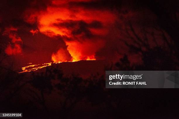 Mauna Loa erupts for the first time since 1984 on Hawaii Island, on November 28, 2022. - The world's largest active volcano burst into life for the...