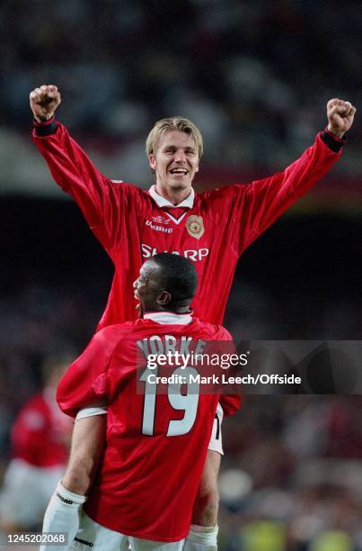 May 1999 - Champions League Final - Manchester United v FC Bayern Munich - David Beckham and Dwight Yorke of Man Utd celebrate victory -