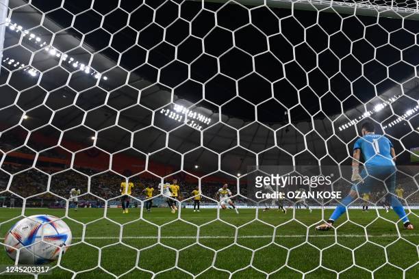Senegal's forward Ismaila Sarr celebrates after he scored from the penalty shot during the Qatar 2022 World Cup Group A football match between...