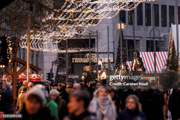 People walk through the Christmas market at Breitscheidplatz on November 29, 2022 in Berlin, Germany. Retailers across Germany are hoping for a...