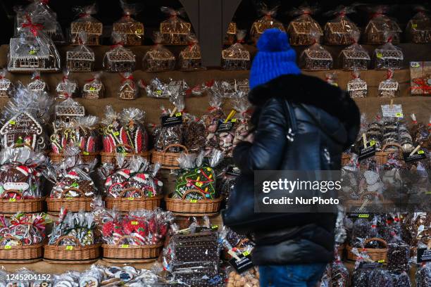 View of a stand with sweets and Christmas gifts on display at the Christmas Market on the Main Market Square in Krakow. On Monday, November 28 in...