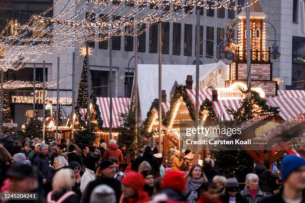 People walk through the Christmas market at Breitscheidplatz on November 29, 2022 in Berlin, Germany. Retailers across Germany are hoping for a...