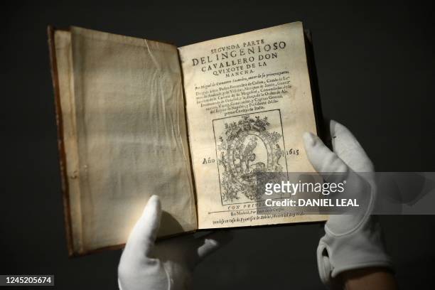 Two volumes of Miguel de Cervantes's 'Don Quixote' novel, are pictured at Sotheby's auction house in central London on November 25 ahead of their...