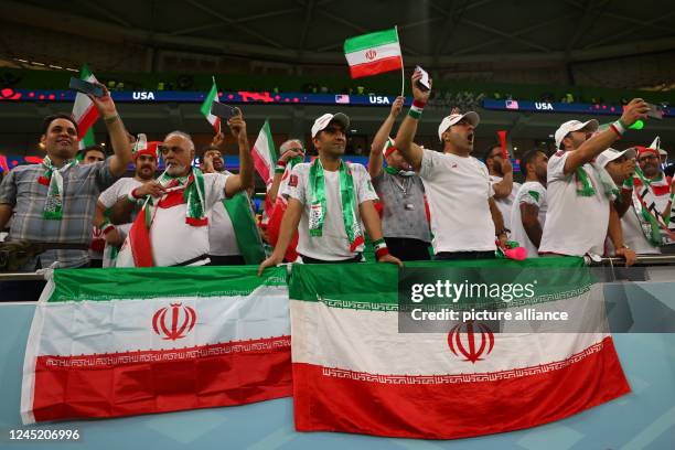 November 2022, Qatar, Doha: Soccer, World Cup 2022 in Qatar, Iran - USA, preliminary round, group B, match day 3 at Al-Thumama Stadium in Doha, fans...