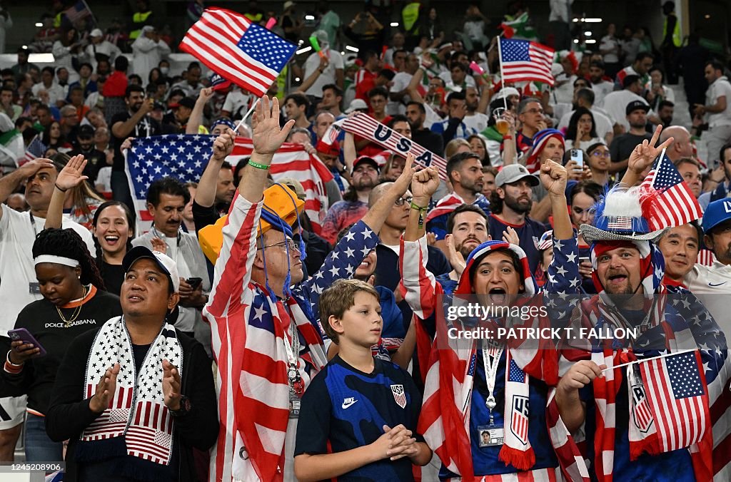 USA Fans Cheer During The Qatar 2022 World Cup Group B Football Match usa-fans-cheer-during-the-qatar-2022-world-cup-group-b-football-match