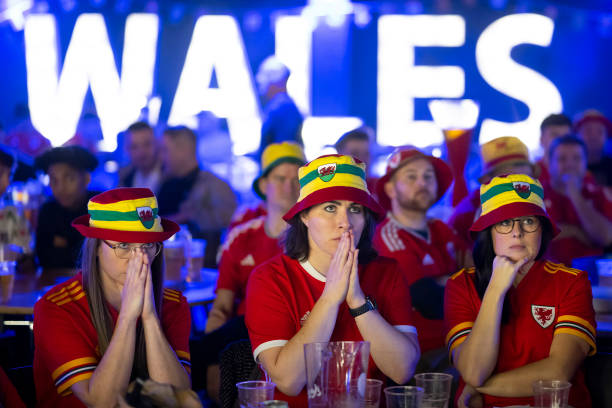 GBR: Football Fans Watch Wales-England World Cup Match In Penarth