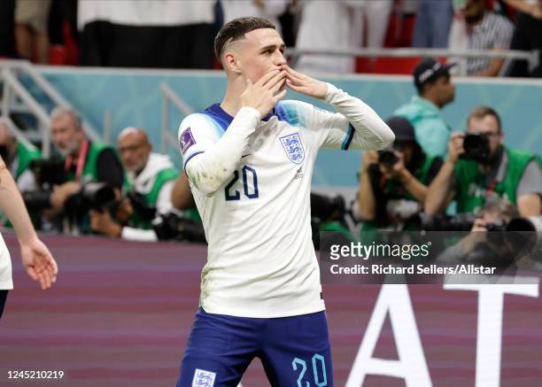 Phil Foden of England celebrates the second goal during the FIFA World Cup Qatar 2022 Group B match between Wales and England at Al Janoub Stadium on...