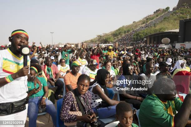 Senegalese people celebrate after Senegal qualifies to round 16 by defeating Ecuador in the FIFA World Cup Qatar 2022 Group A match, near renaissance...