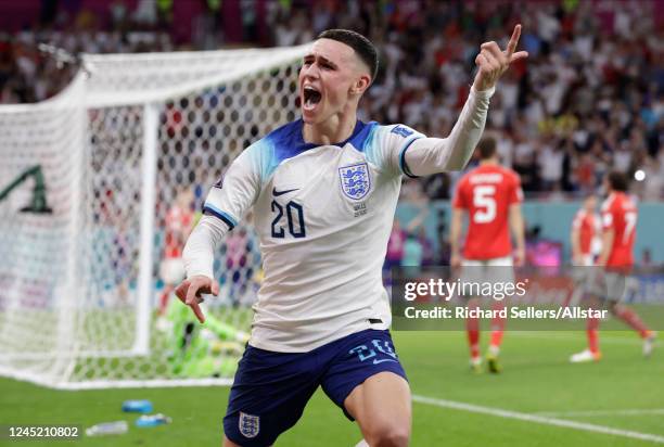 Phil Foden of England celebrtates goal during the FIFA World Cup Qatar 2022 Group B match between Wales and England at Al Janoub Stadium on November...