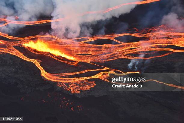 View from Mauna Loa, the world's largest active volcano, began to erupt overnight, prompting authorities to open shelters "as a precaution" on...