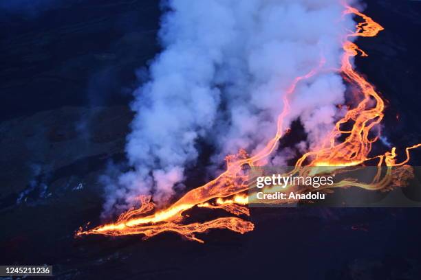 View from Mauna Loa, the world's largest active volcano, began to erupt overnight, prompting authorities to open shelters "as a precaution" on...