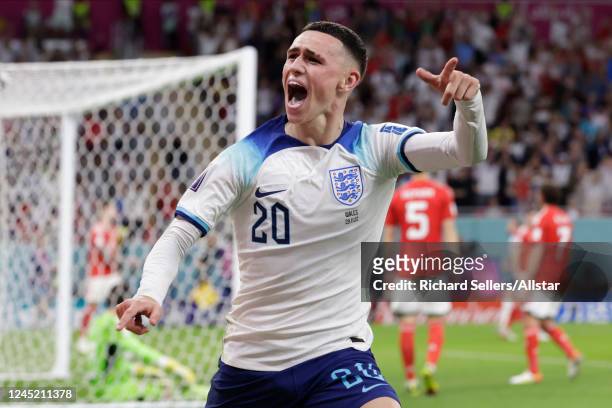 Phil Foden of England celebrates his goal during the FIFA World Cup Qatar 2022 Group B match between Wales and England at Al Janoub Stadium on...