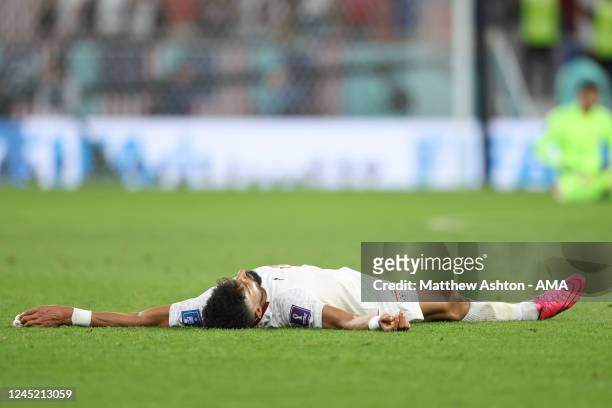 Dejected Ramin Rezaeian of Iran as his team is knocked out of the FIFA World Cup in the group stage during the FIFA World Cup Qatar 2022 Group B...