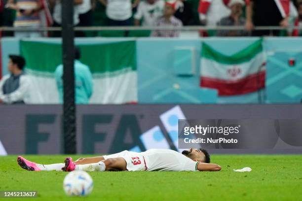 Ramin Rezaeian right-back of Iran and Sepahan FC dejected after losing the FIFA World Cup Qatar 2022 Group B match between IR Iran and USA at Al...