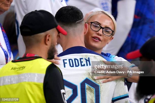 England's Phil Foden with his girlfriend Rebecca Cooke during the FIFA World Cup Group B match at the Ahmad Bin Ali Stadium, Al Rayyan, Qatar....