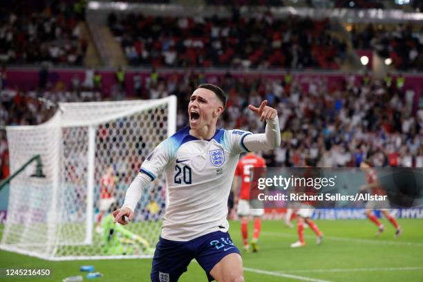 Phil Foden of England celebrtates goal during the FIFA World Cup Qatar 2022 Group B match between Wales and England at Al Janoub Stadium on November...