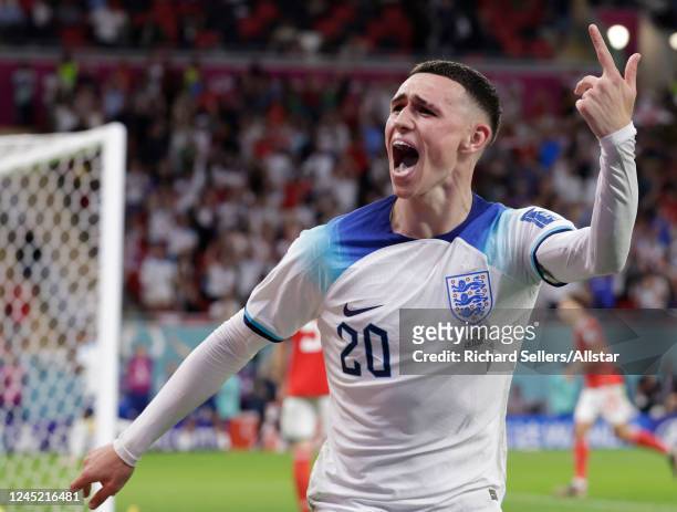 Phil Foden of England celebrtates goal during the FIFA World Cup Qatar 2022 Group B match between Wales and England at Al Janoub Stadium on November...