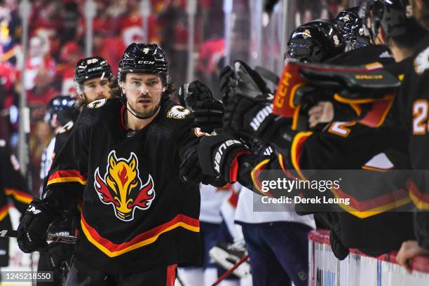 Rasmus Andersson of the Calgary Flames celebrates scoring against the Florida Panthers during the first period at Scotiabank Saddledome on November...