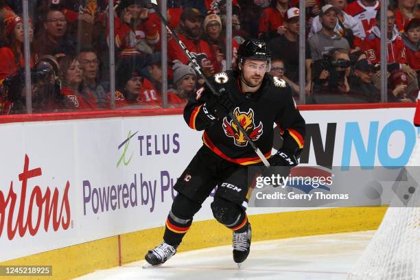 Rasmus Andersson of the Calgary Flames skates up ice against the Florida Panthers at Scotiabank Saddledome on November 29, 2022 in Calgary, Alberta,...