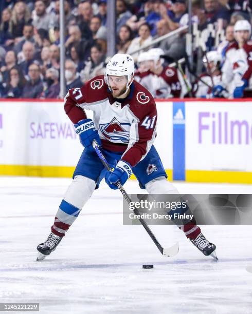 Alex Galchenyuk of the Colorado Avalanche plays the puck down the ice during third period action against the Winnipeg Jets at the Canada Life Centre...