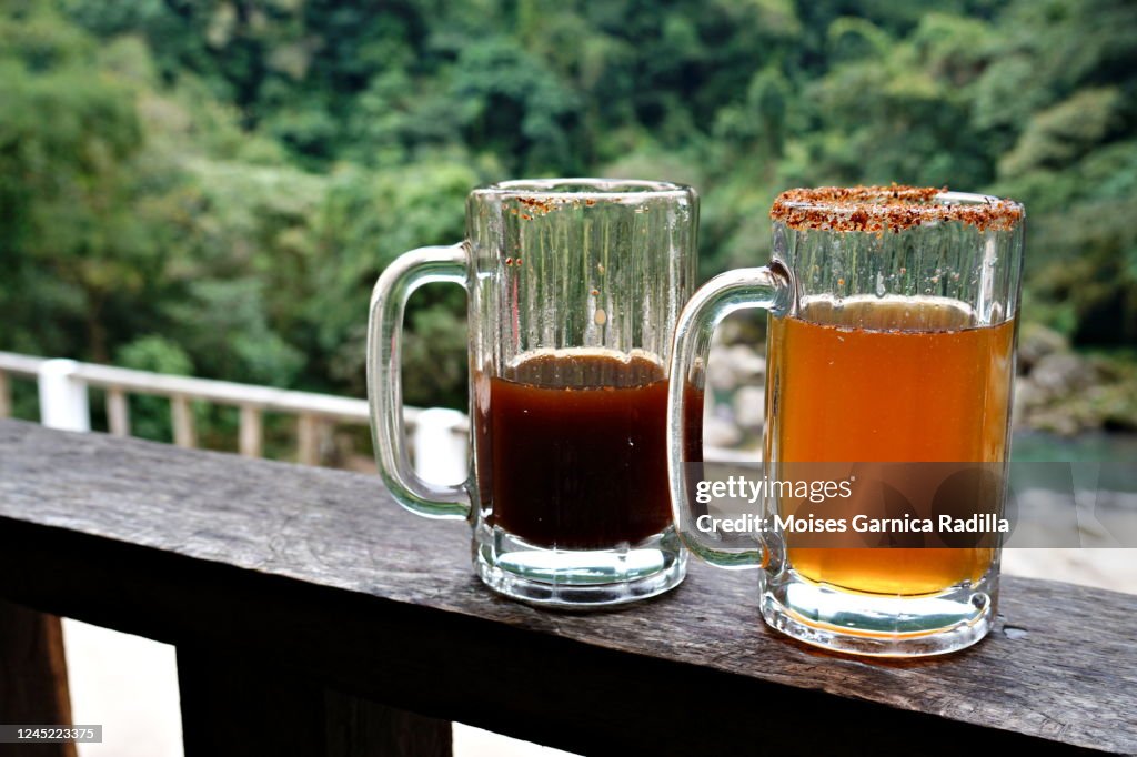 Pair of beer mugs, light and dark beer, to refresh the body