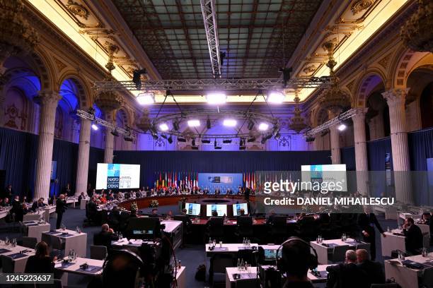Participants attend a meeting of the North Atlantic Council in Foreign Ministers Session during the meeting of the NATO Ministers of Foreign Affairs...