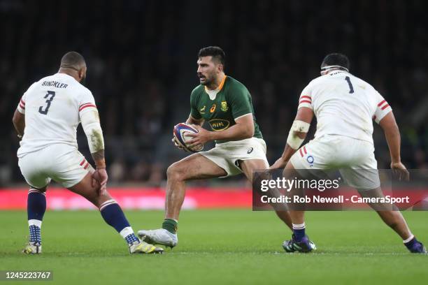 South Africa's Damian de Allende takes on England's Kyle Sinckler and Mako Vunipola during the Autumn International match between England and South...