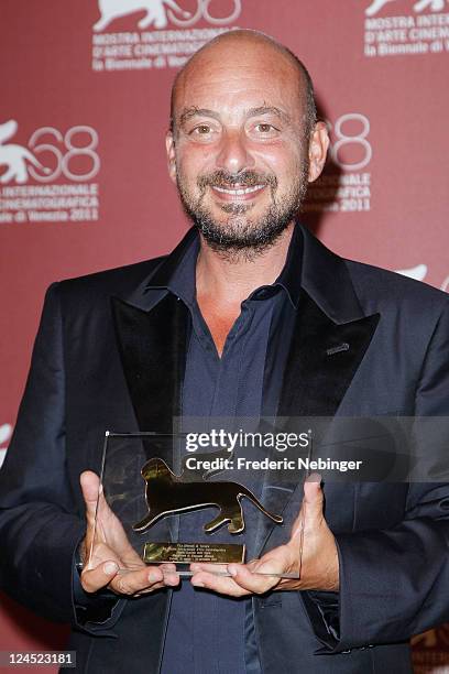 Director Emanuele Crialese of "Terraferma" poses with the Special Jury Prize during the Award Winners Photocall during the 68th Venice Film Festival...