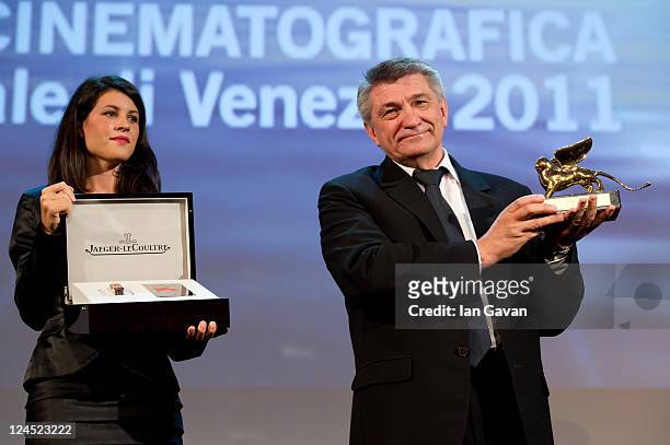 Director Aleksandr Sokurov of 'Faust' accepts the Golden Lion for Best Film during the Closing Ceremony during the 68th Venice Film Festival at...