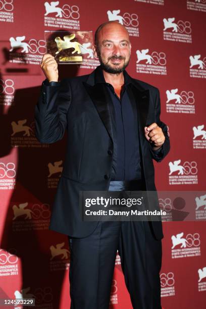 Director Emanuele Crialese of 'Terraferma' poses with the special Jury prize during the Award Winners" Photocall during the 68th Venice International...