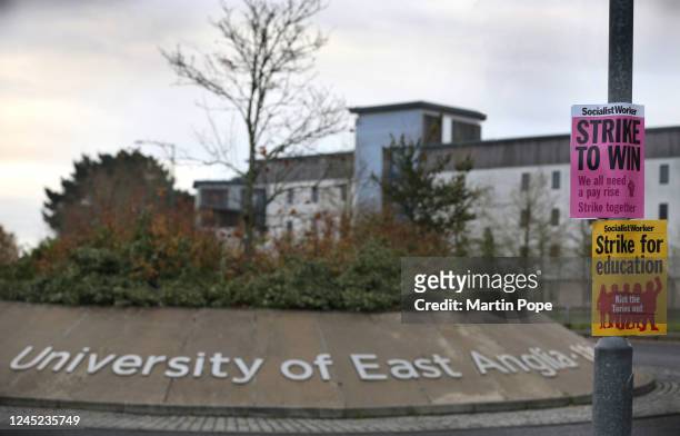 Signs supporting the strike on the main campus of the University of East Anglia on November 30, 2022 in Norwich, United Kingdom. University staff...