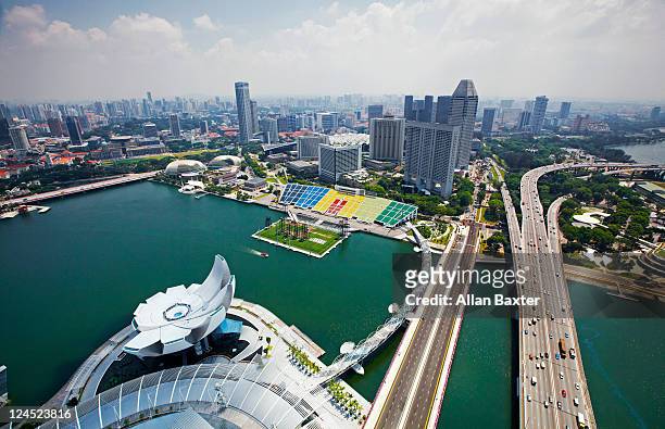 artscience museum and skyline of singapore - artscience museum stock pictures, royalty-free photos & images
