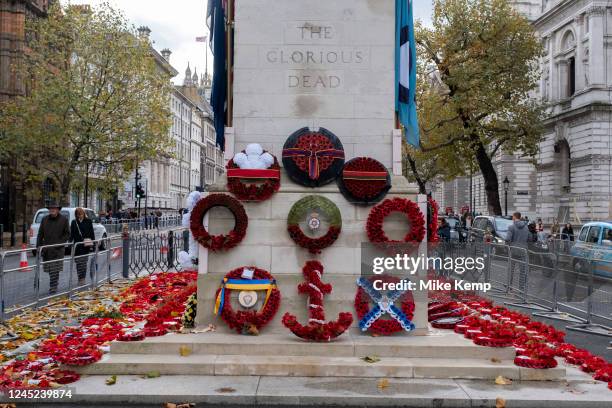 Wreaths and poppies in remembrance to commemorate the dead of the Great Wars laid at The Cenotaph on 17th November 2022 in London, United Kingdom....