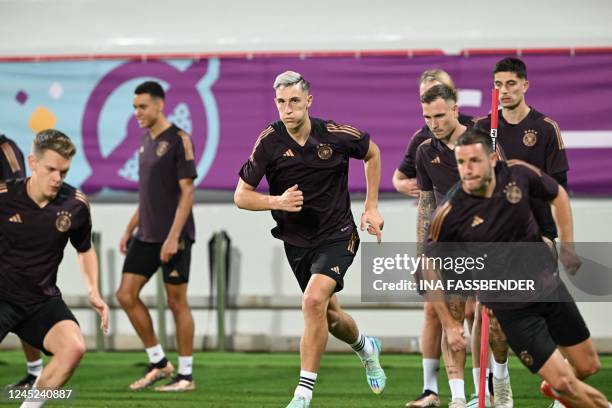 Germany's defender Nico Schlotterbeck takes part in a training session at the Al Shamal Stadium in Al Shamal, north of Doha on November 30 on the eve...