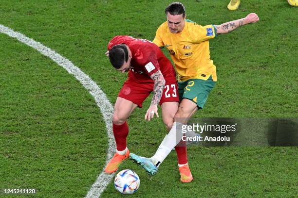 Pierre-Emile Hojbjerg of Denmark in action Jackson Irvine of Australia during the FIFA World Cup Qatar 2022 Group D match between Australia and...