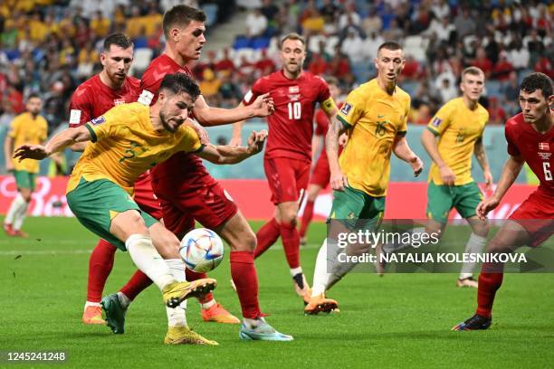 Australia's forward Mathew Leckie attempts to score during the Qatar 2022 World Cup Group D football match between Australia and Denmark at the...
