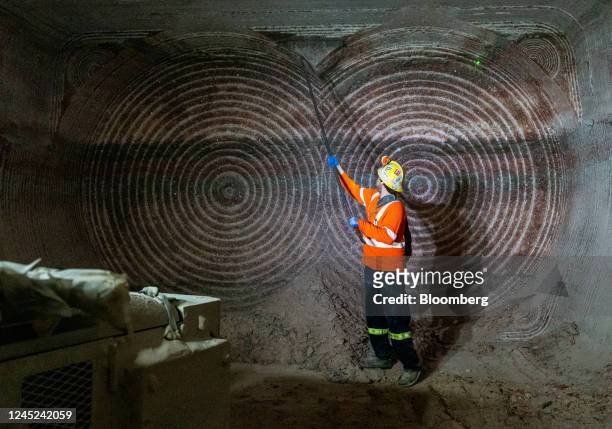 Worker in front of a mine wall inside the Nutrien Cory potash mine in Saskatoon, Saskatchewan, Canada, on Tuesday, Nov. 29, 2022. Nutrien Ltd., the...