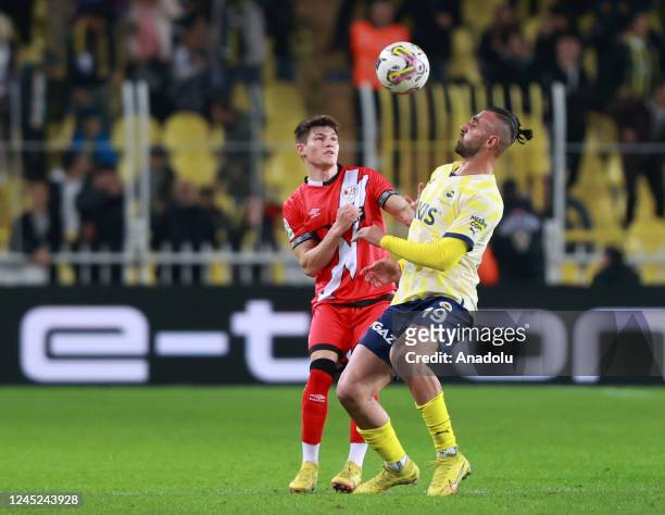 Serdar Dursun of Fenerbahce in action against Jose Garcia of Rayo Vallecano during the Friendship Cup soccer match between Fenerbahce and Rayo...