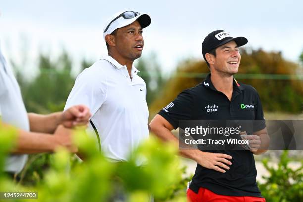 Tiger Woods chats with Viktor Hovland of Norway during Wednesdays pro-am group prior to the Hero World Challenge at Albany on November 30, 2022 in...