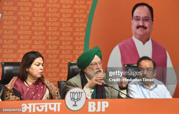 MPs Hans Raj Hans, Ramesh Bidhuri, Manoj Tiwari, Meenakshi Lekhi, Union Minister Hardeep Singh Puri, and Harsh Vardhan, during a press conference for...