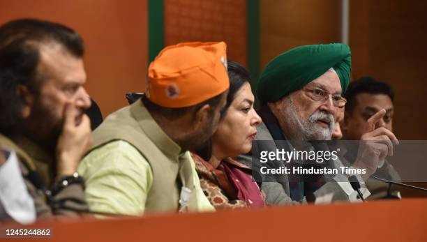 MPs Hans Raj Hans, Ramesh Bidhuri, Manoj Tiwari, Meenakshi Lekhi, Union Minister Hardeep Singh Puri, and Harsh Vardhan, during a press conference for...