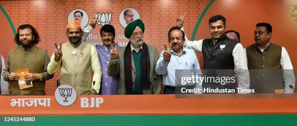 MPs Hans Raj Hans, Ramesh Bidhuri, Manoj Tiwari, Union Minister Hardeep Singh Puri, Harsh Vardhan, Parvesh Sahib Singh Verma and Sambit Patra, during...