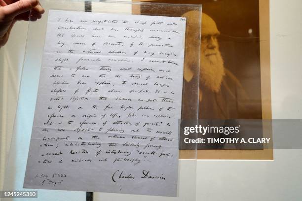 Signed manuscript excerpt from Charles Darwins "On the Origin of Species," is displayed during a media preview at Sotheby's in New York on November...