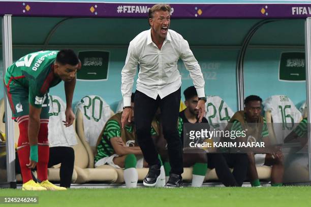 Saudi Arabia's French coach Herve Renard shouts instructions to his players from the touchline during the Qatar 2022 World Cup Group C football match...
