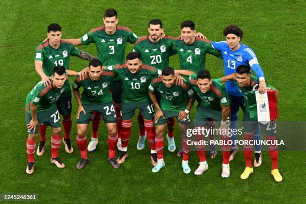 Mexico's defender Jorge Sanchez, defender Cesar Montes, forward Henry Martin, midfielder Edson Alvarez, goalkeeper Guillermo Ochoa and , forward...