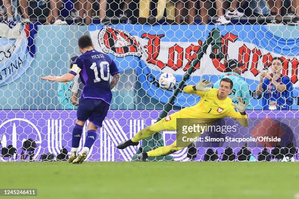 Poland goalkeeper Wojciech Szczesny saves a penalty from Lionel Messi of Argentina during the FIFA World Cup Qatar 2022 Group C match between Poland...