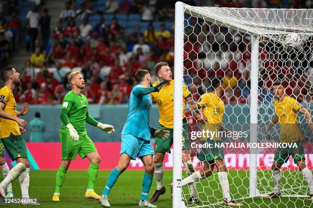 Australia's defender Milos Degenek, Denmark's goalkeeper Kasper Schmeichel, Australia's goalkeeper Mathew Ryan, Australia's defender Harry Souttar,...