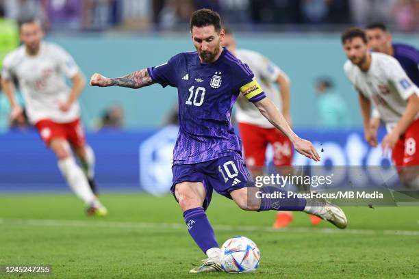 Lionel Messi of Argentina takes a penalty kick during the FIFA World Cup Qatar 2022 Group C match between Poland and Argentina at Stadium 974 on...