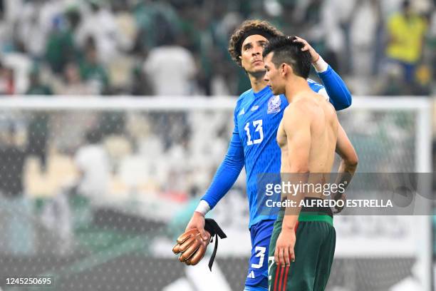 Mexico's goalkeeper Guillermo Ochoa reacts at the end of the Qatar 2022 World Cup Group C football match between Saudi Arabia and Mexico at the...