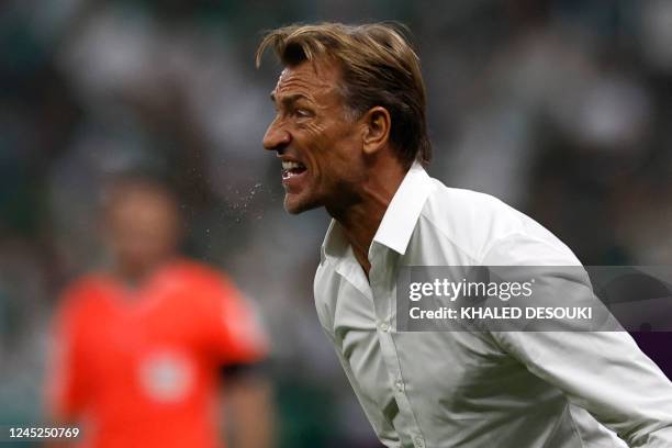 Saudi Arabia's French coach Herve Renard shouts instructions to his players from the touchline during the Qatar 2022 World Cup Group C football match...